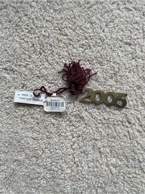 Bombay Metallic Gold 2005 Year Pendant with Burgundy Tassel